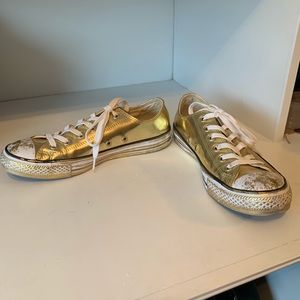 Vintage gold converse.